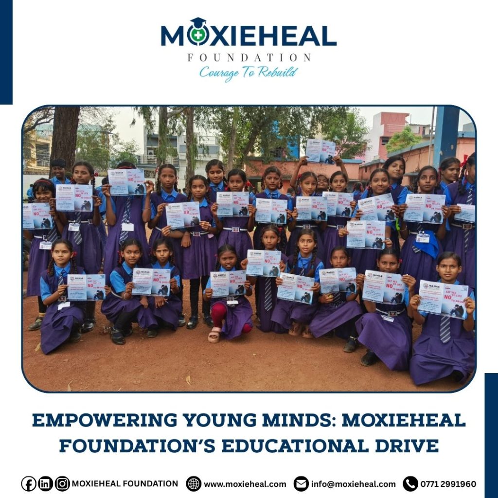 Children's Showing Anti drug Fliers in Moxieheal Educational event.